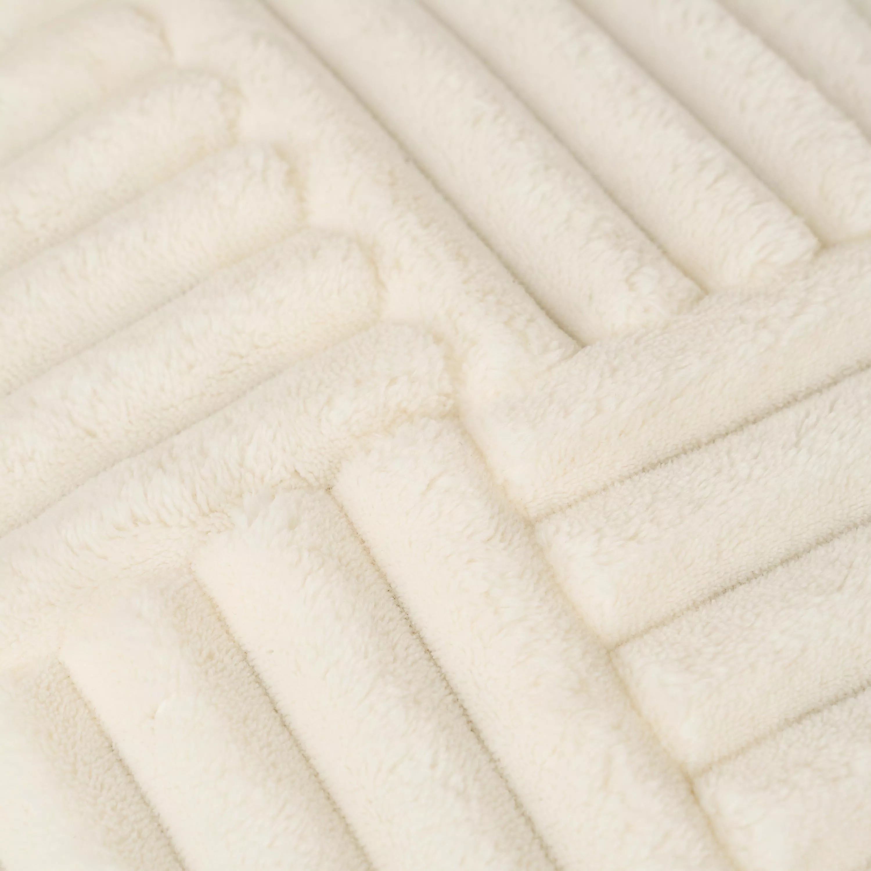 CUSCINO IN VELLUTO A COSTE CON CAPELLI INCROCIATI