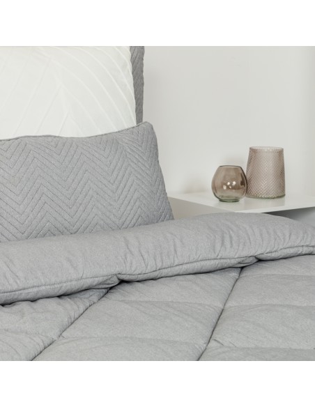 Trapunta effetto consumato tinta unita