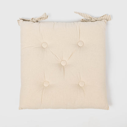 CUSCINO IN COTONE TINTA UNITA CON BOTTONI 0031