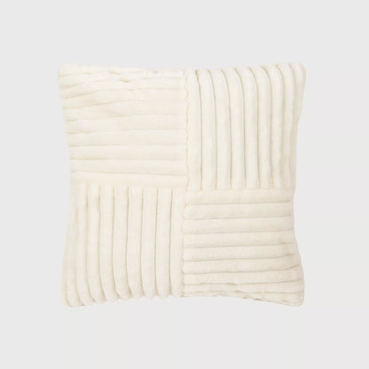 CUSCINO IN VELLUTO A COSTE CON CAPELLI INCROCIATI